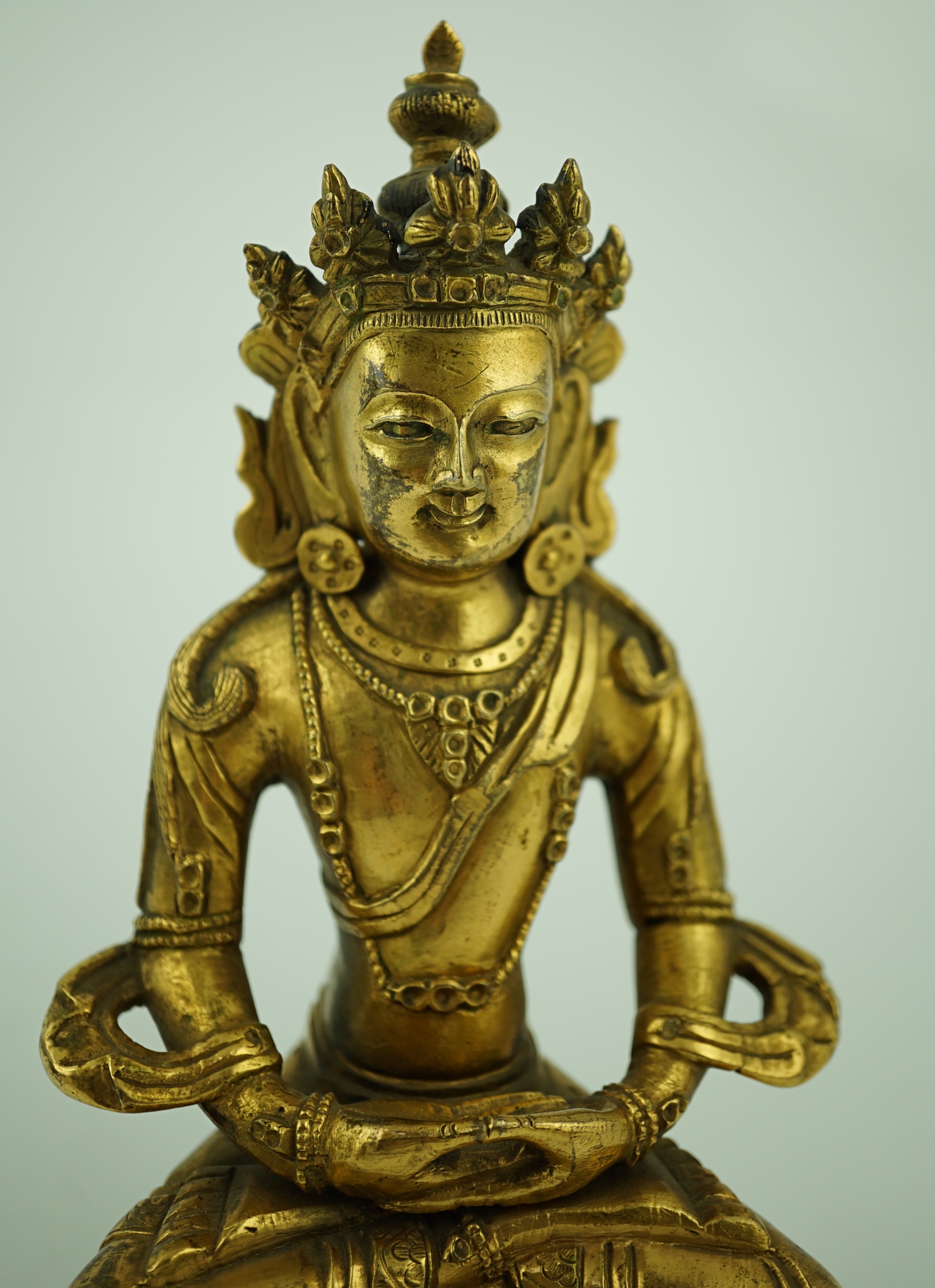 A Tibetan gilt bronze figure of Avalokeshvara, 18th century